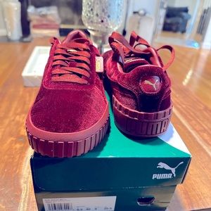 Brand-new, never worn size 9 women’s red velvet puma sneaker.